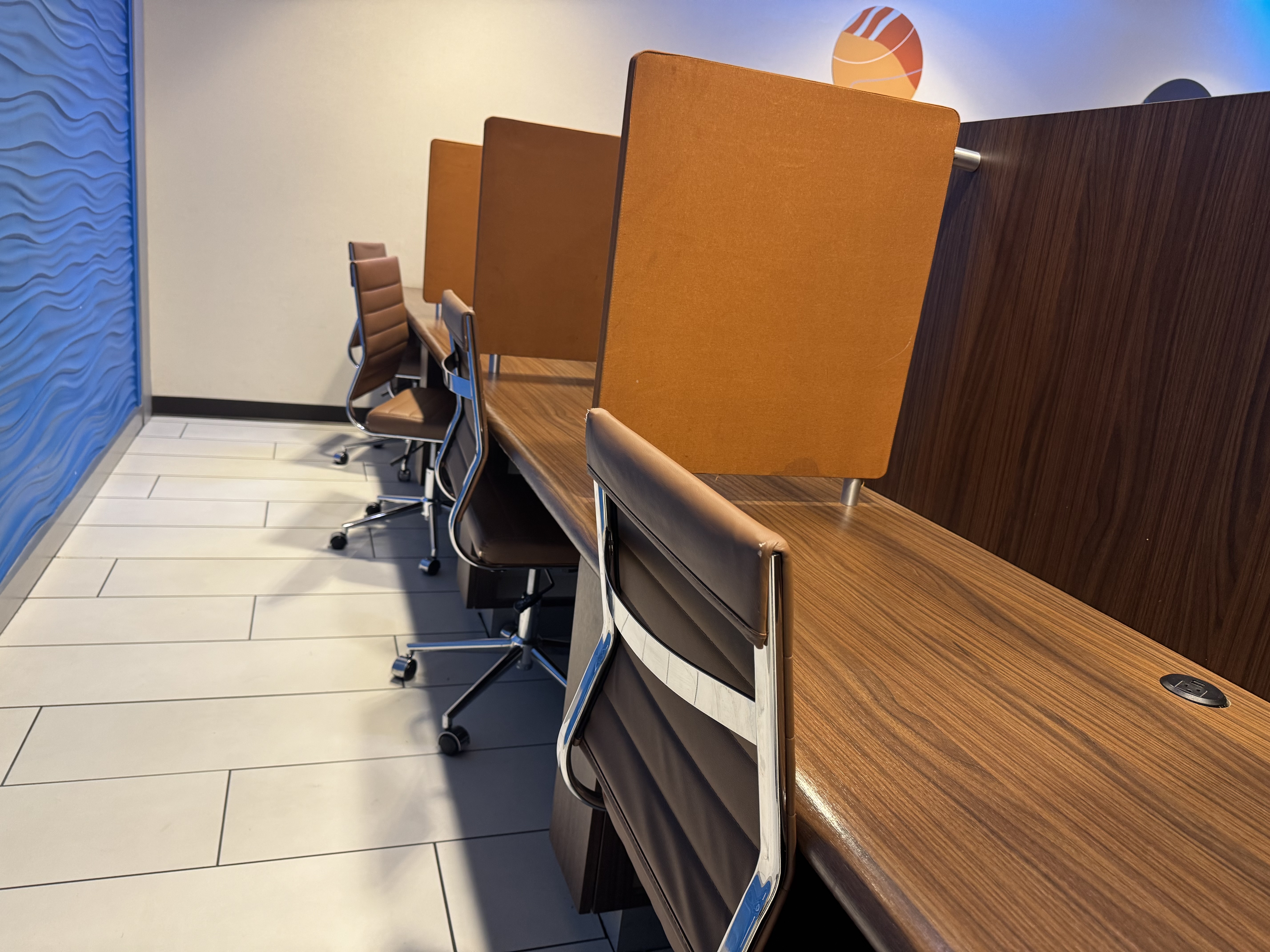 KLM Crown Lounge additional seating area with tables and chairs